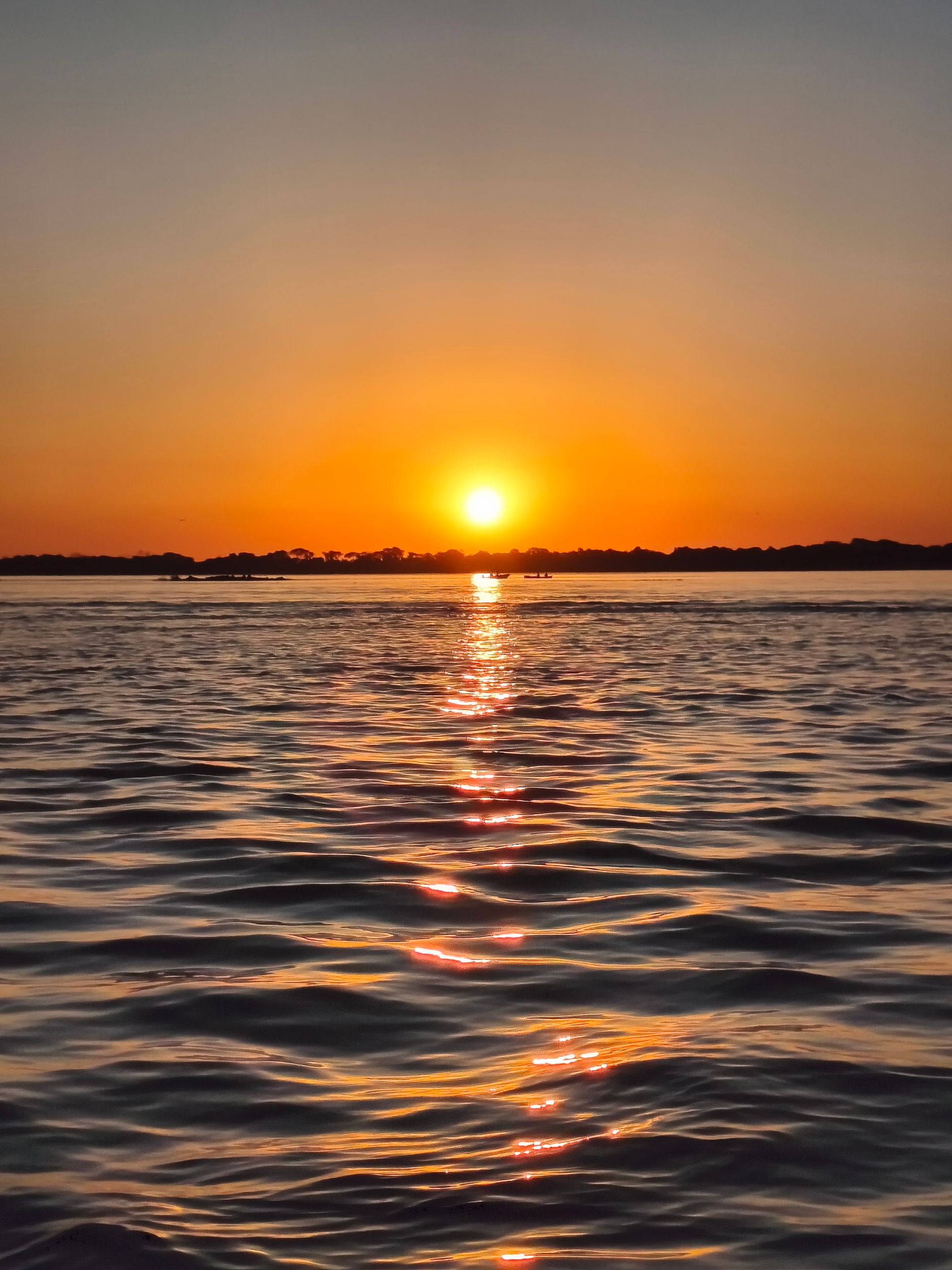 Sunset over the water